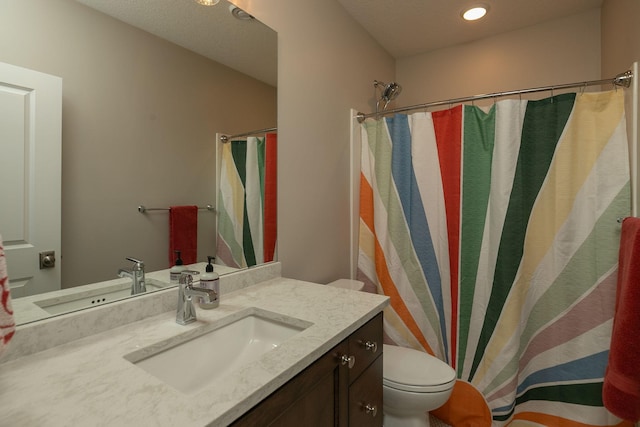 992 Southwell Enclave NE, Byron, MN 55920 - full bathroom with toilet, a shower with curtain, and vanity