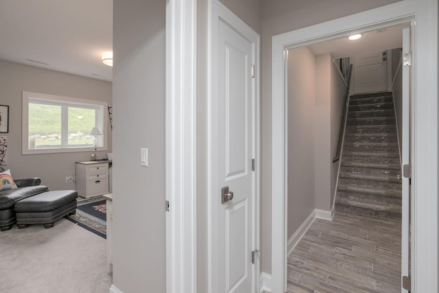 992 Southwell Enclave NE, Byron, MN 55920 - hall with wood finished floors, baseboards, and stairway