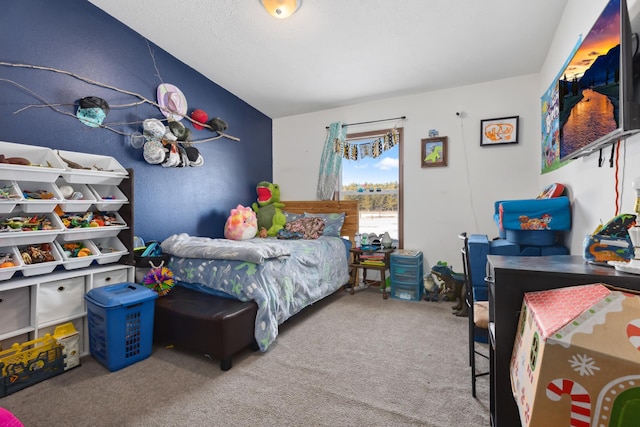 carpeted bedroom with vaulted ceiling