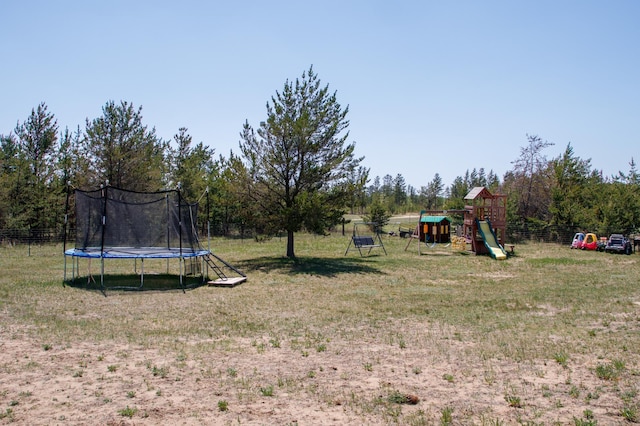 15743 County Road 31, Menahga, MN 56464 - view of yard with a playground and a trampoline