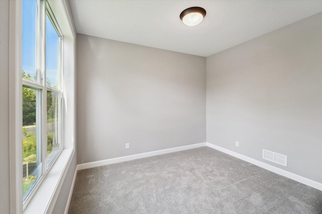 view of carpeted spare room