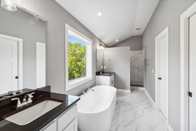 bathroom with shower with separate bathtub, vanity, and vaulted ceiling