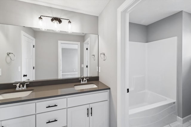 bathroom with shower / bath combination and vanity