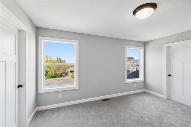 unfurnished bedroom featuring carpet