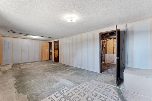 basement with a textured ceiling