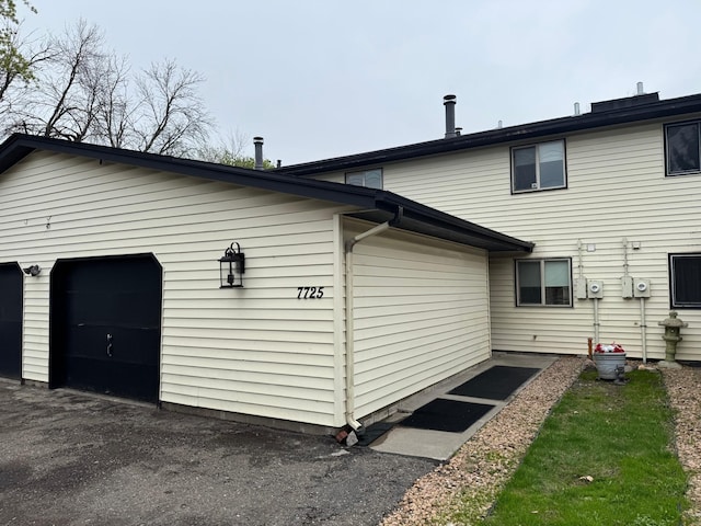 exterior space with a garage