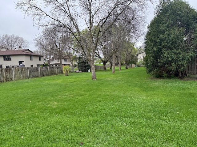 view of yard with fence