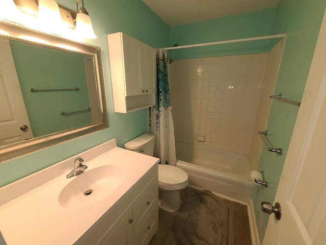 bathroom featuring toilet, shower / bath combo, and vanity