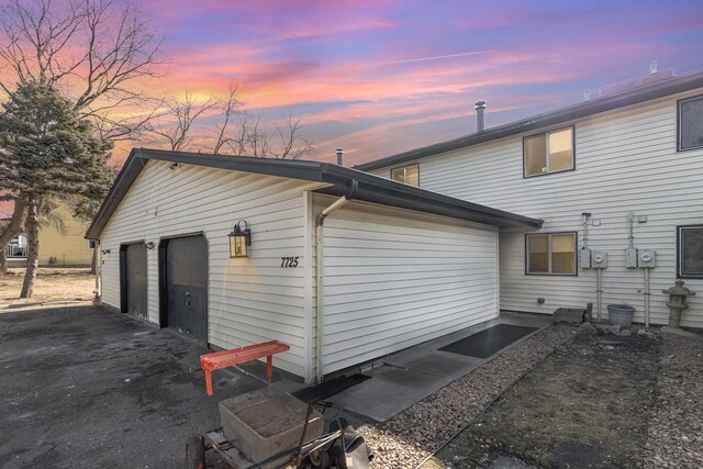 exterior space with a garage