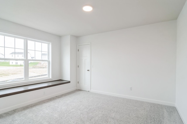 view of carpeted spare room