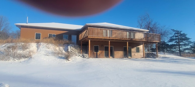 view of front of property featuring a wooden deck