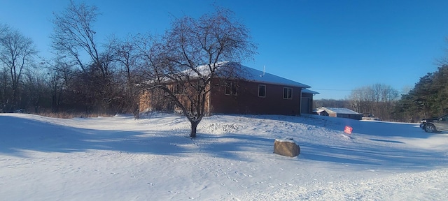 view of snow covered property