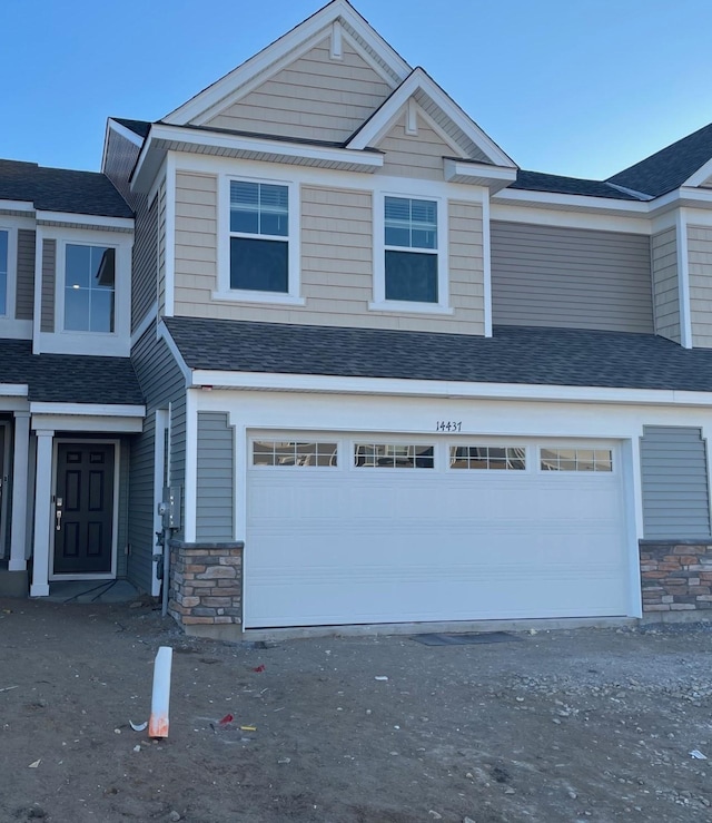 view of front of house with a garage