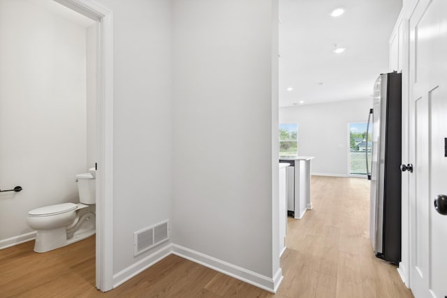 hallway featuring light wood-type flooring