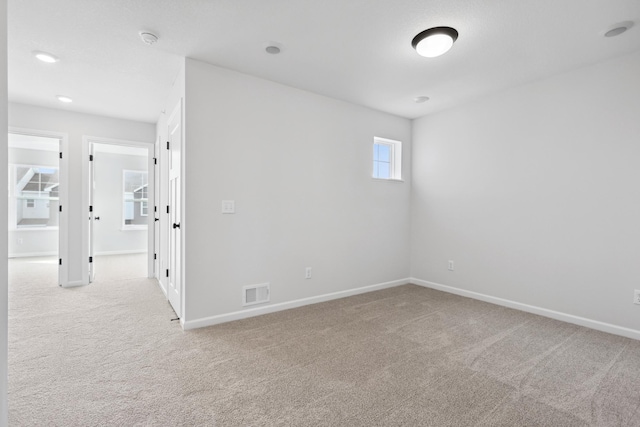 view of carpeted spare room