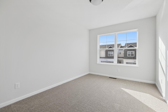 view of carpeted spare room