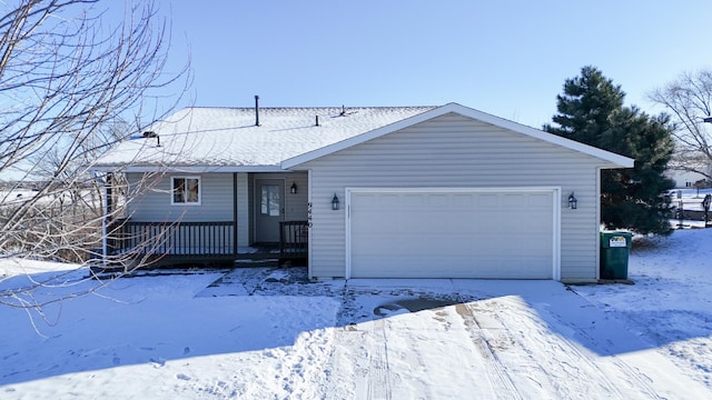 ranch-style house featuring a garage