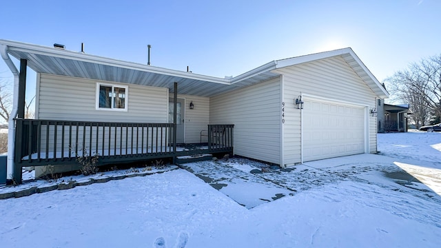 view of front of house with a porch and a garage