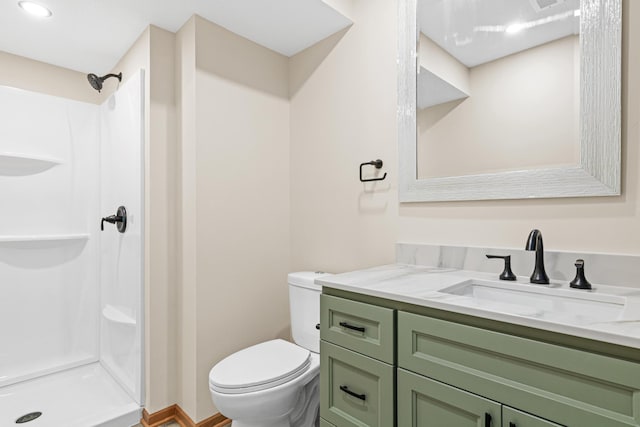 bathroom featuring a stall shower, visible vents, vanity, and toilet