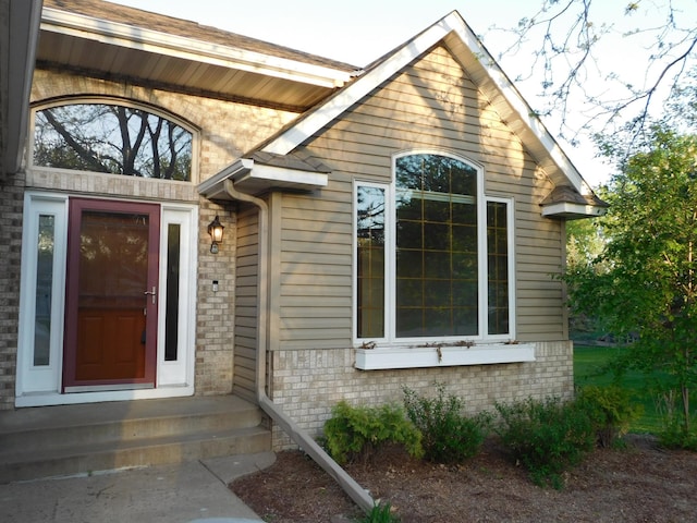6462 Kingfisher Ct, Lino Lakes, MN 55014 - doorway to property with brick siding