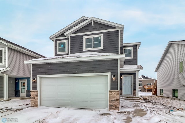 craftsman house featuring a garage