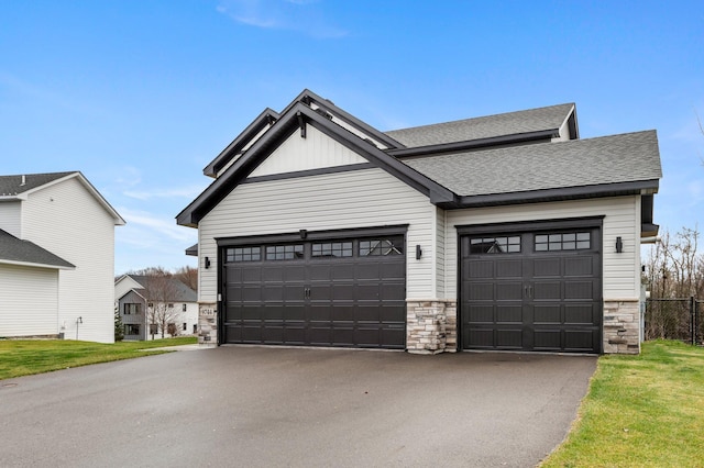 garage featuring a yard