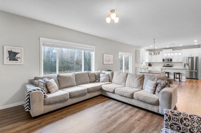 living room with light hardwood / wood-style floors