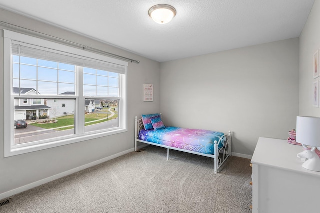 bedroom featuring carpet