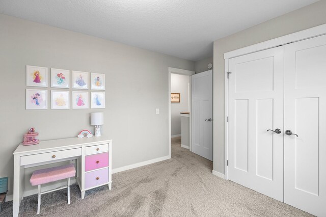 interior space featuring a textured ceiling