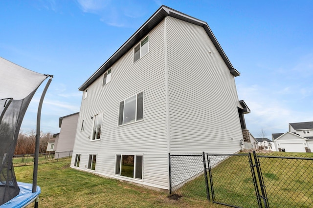 view of home's exterior featuring a lawn