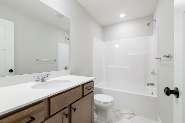 full bath with tub / shower combination, toilet, marble finish floor, and vanity