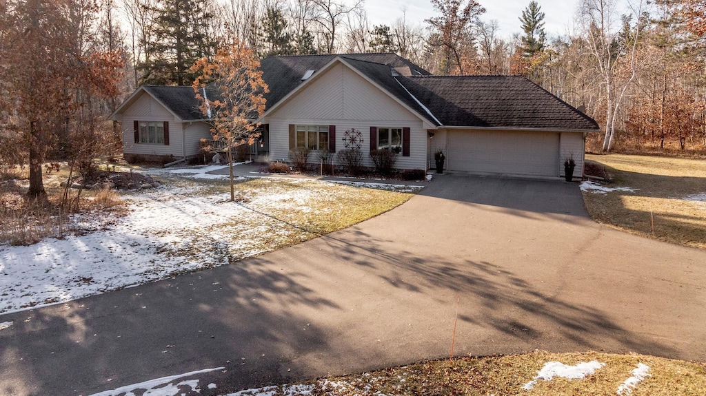 single story home with a garage