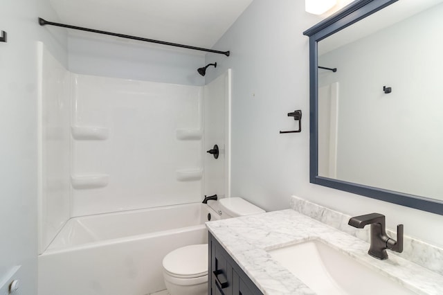 full bathroom with vanity, washtub / shower combination, and toilet