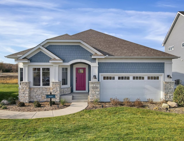 craftsman house with cooling unit, a garage, and a front yard