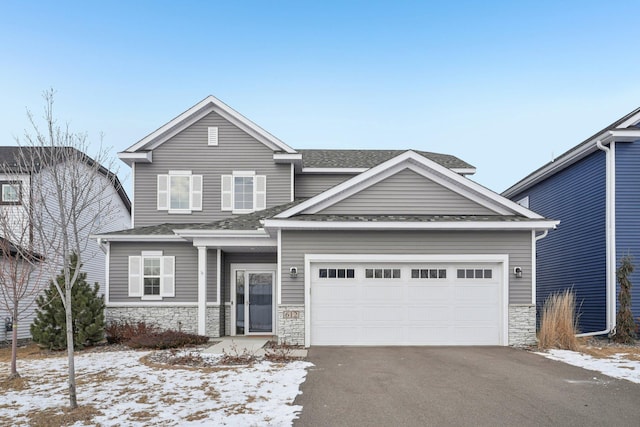 view of front of property featuring a garage