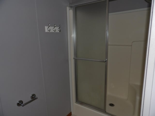 bathroom with an enclosed shower