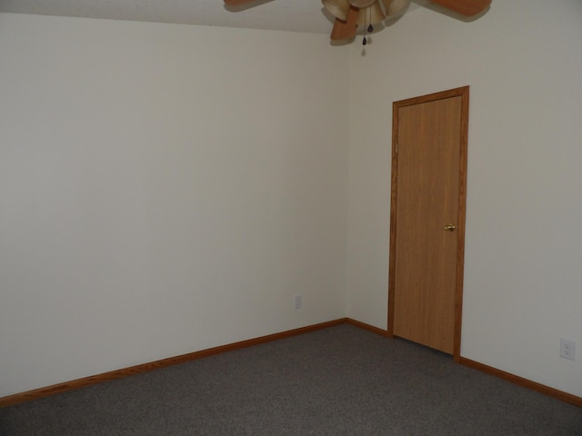 carpeted empty room with ceiling fan