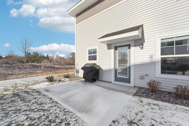 exterior space featuring a grill