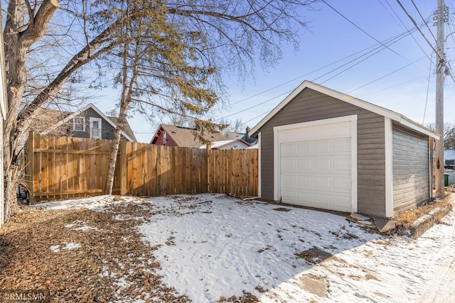 view of snow covered garage