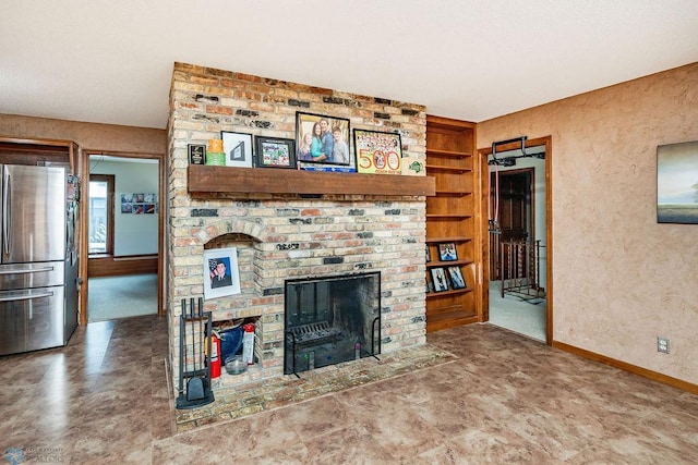 living room featuring a fireplace and built in features