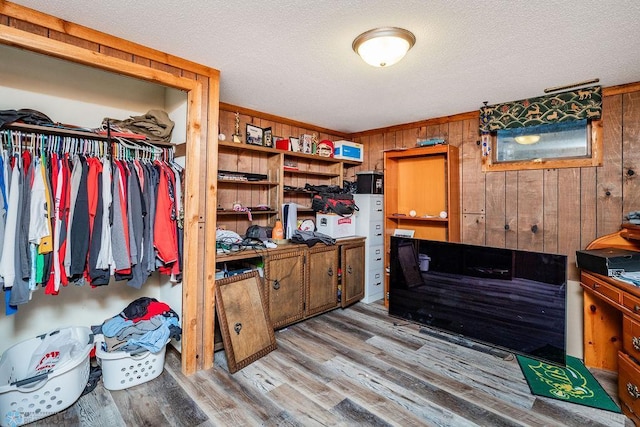 spacious closet featuring light hardwood / wood-style floors