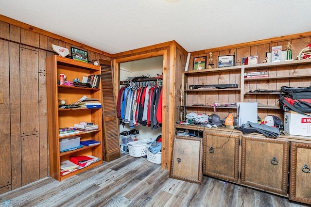 spacious closet featuring hardwood / wood-style floors