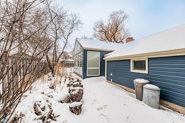 view of snow covered property