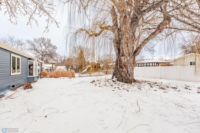 view of yard covered in snow