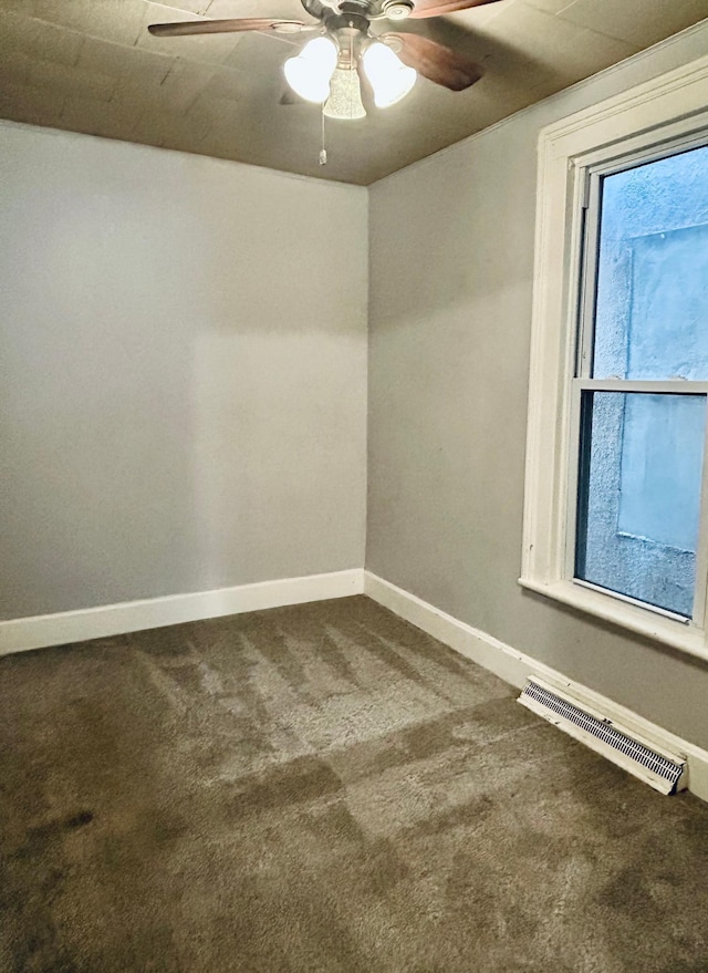 carpeted empty room with ceiling fan