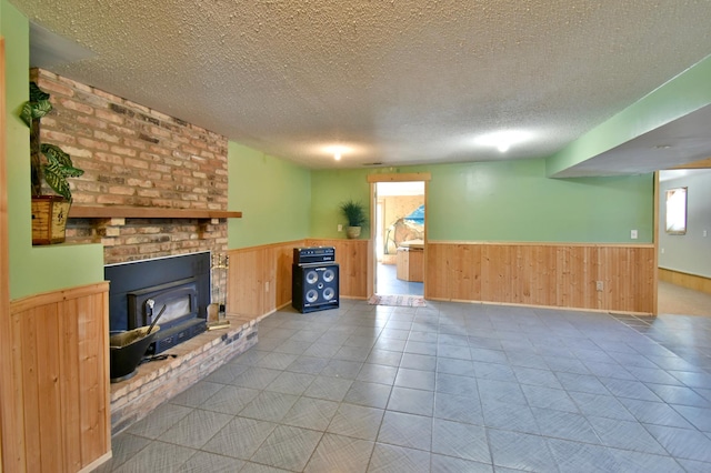 unfurnished living room featuring a textured ceiling