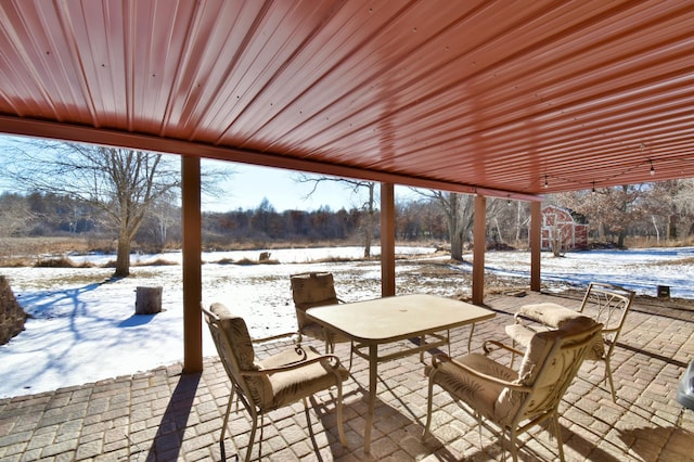 view of snow covered patio