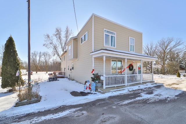 view of front of home featuring covered porch