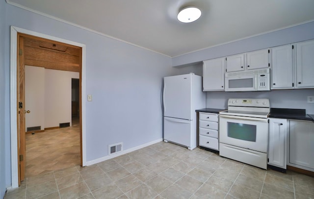 kitchen with white cabinetry, white appliances, baseboards, dark countertops, and visible vents