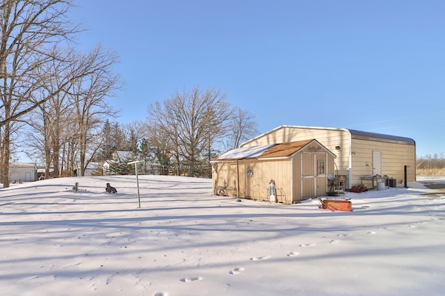 exterior space with a storage unit and an outdoor structure